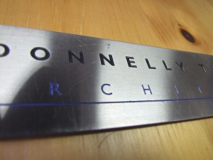 Engraved stainless steel plaque detail